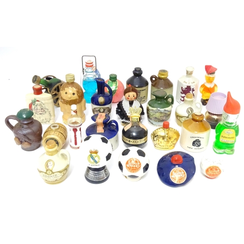 1061 - Spirits / Liqueurs etc.: A quantity of assorted novelty miniature bottles to include examples for Wi... 