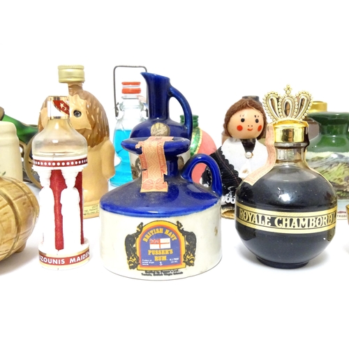 1061 - Spirits / Liqueurs etc.: A quantity of assorted novelty miniature bottles to include examples for Wi... 