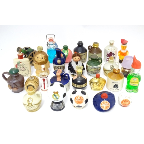 1061 - Spirits / Liqueurs etc.: A quantity of assorted novelty miniature bottles to include examples for Wi... 