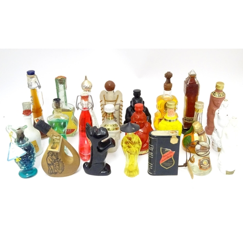 1061 - Spirits / Liqueurs etc.: A quantity of assorted novelty miniature bottles to include examples for Wi... 