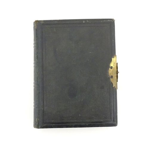 2049 - A Victorian leather bound scrapbook / album with metal clasp to include various engravings, clipping... 