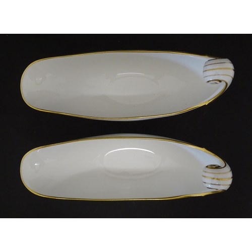 66 - A pair of large French Dore a Sevres sauce boats with scroll handles, decorated with gilt crowned Na... 