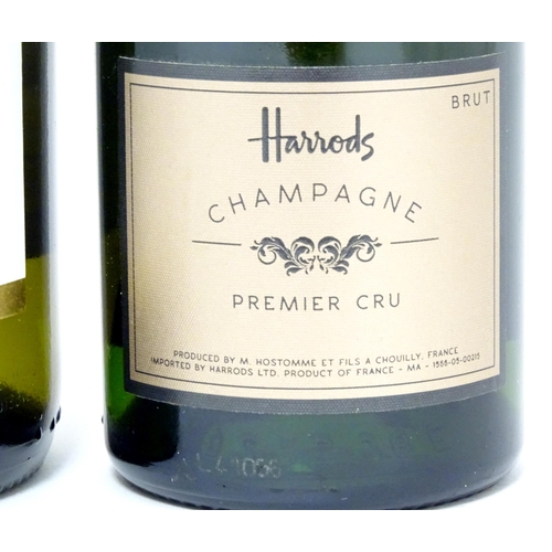 1038 - Wine : Four assorted bottles of 750ml Harrods wine, together with a half bottle of Harrods champagne... 