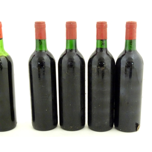 1047 - Red Wine : Twelve assorted 750ml bottles of  red wine to include 4 bottles of Mouton-Cadet Bordeaux,... 