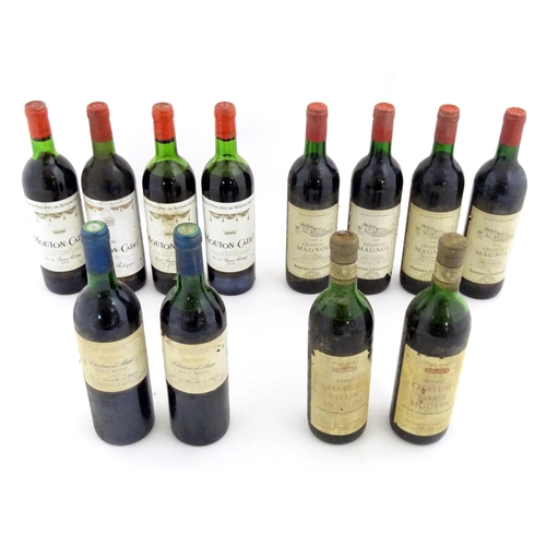 1047 - Red Wine : Twelve assorted 750ml bottles of  red wine to include 4 bottles of Mouton-Cadet Bordeaux,... 