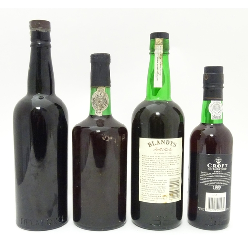 1050 - Port / Fortified Wine : Four assorted bottles of fortified wine to include a bottle of Delaforce Fin... 