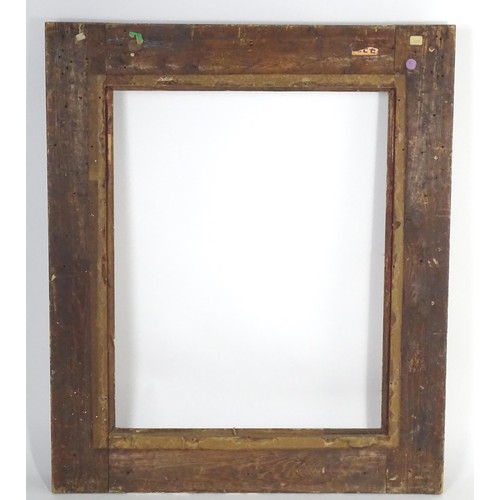 2011 - A large 19thC gilt wood and gesso swept frame. Aperture approx. 36 1/4