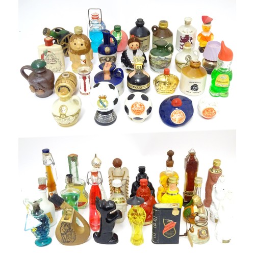 1061 - Spirits / Liqueurs etc.: A quantity of assorted novelty miniature bottles to include examples for Wi... 