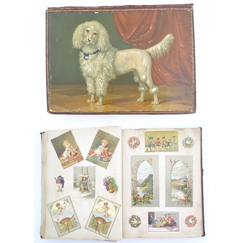 2048 - A Victorian scrapbook / album with applied dog detail to cover, to include various engravings, clipp... 