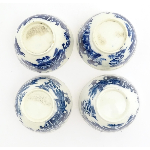 62 - Four blue and white tea bowls and saucers decorated in the Fisherman pattern, possibly Liverpool. Cu... 