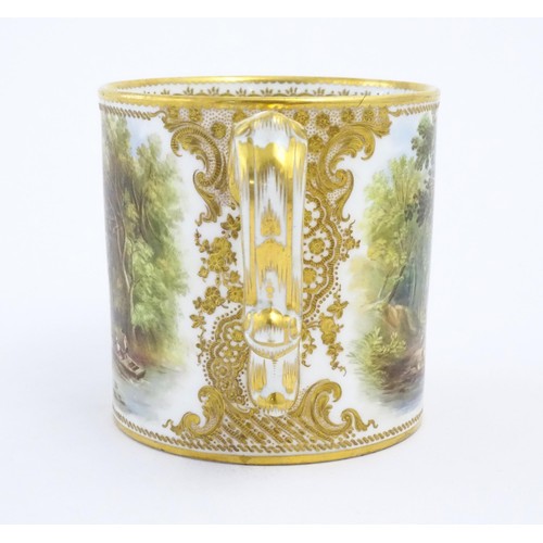 64 - A 19thC English Derby style mug with floral and foliate gilt detail and hand painted landscape scene... 