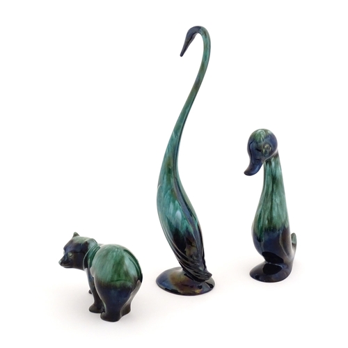 128 - Three Blue Mountain pottery animal figures with a high fired glaze comprising bear, duck, and goose.... 