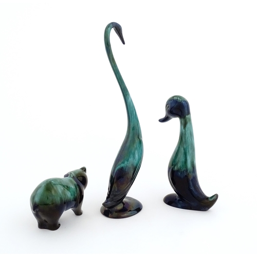 128 - Three Blue Mountain pottery animal figures with a high fired glaze comprising bear, duck, and goose.... 