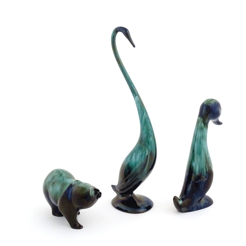 128 - Three Blue Mountain pottery animal figures with a high fired glaze comprising bear, duck, and goose.... 