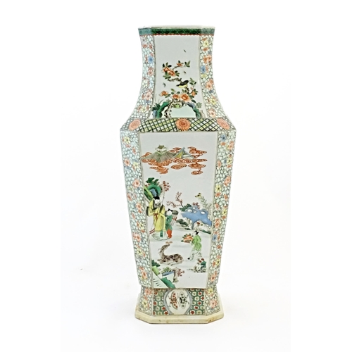 49 - A Chinese famille verte vase decorated with panelled decoration depicting figures, elders and warrio... 
