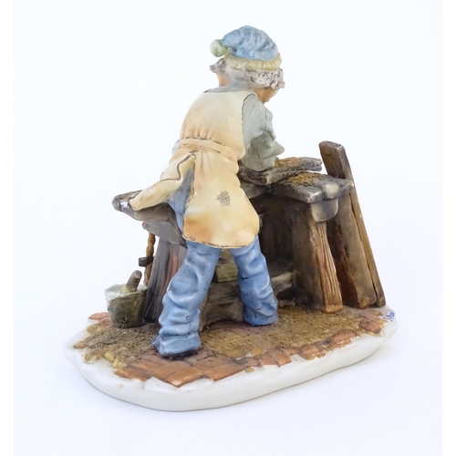 140 - An Italian Capodimonte model of a Carpenter, and signed Milio. Marked under with pattern no. 162. Ap... 