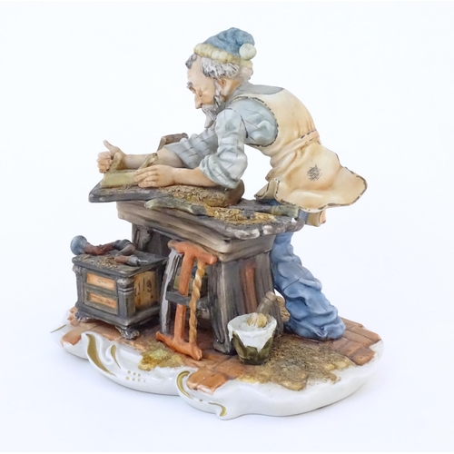 140 - An Italian Capodimonte model of a Carpenter, and signed Milio. Marked under with pattern no. 162. Ap... 