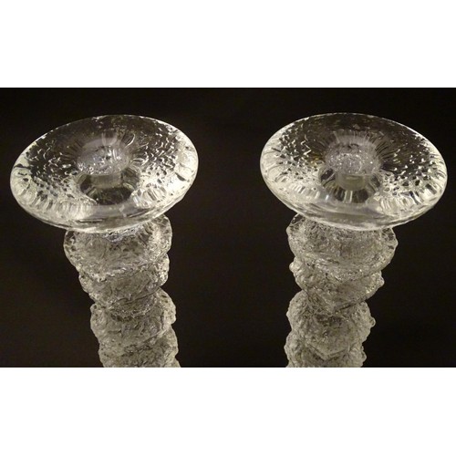 157 - Finnish Art Glass: A pair of Iittala glass candlesticks. 9 3/4