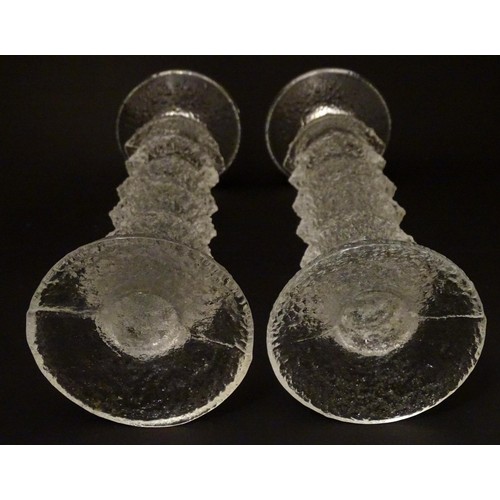 157 - Finnish Art Glass: A pair of Iittala glass candlesticks. 9 3/4