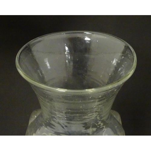 169 - A clear glass vase with Greek key pattern designed by Frank Thrower for Dartington . Approx 9 1/4