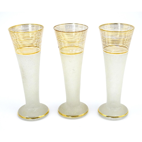 170 - Three retro glass vases with textured body and gilt banding. Approx 8 1/2