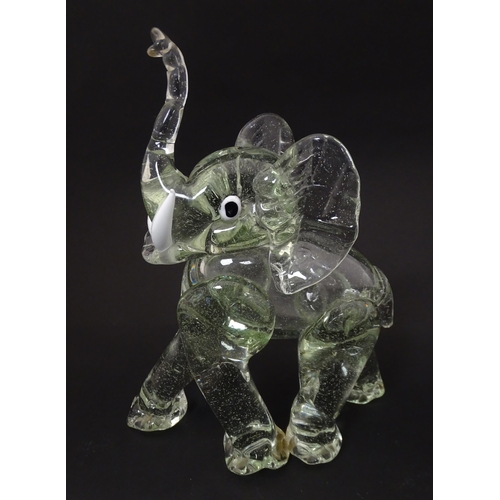 172 - A vintage glass model of an elephant in the manner of Ercole Barovier. Approx 10 1/2