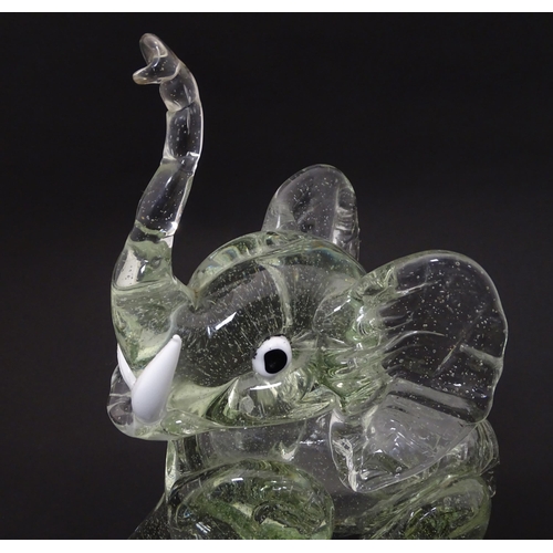 172 - A vintage glass model of an elephant in the manner of Ercole Barovier. Approx 10 1/2