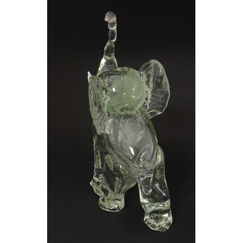 172 - A vintage glass model of an elephant in the manner of Ercole Barovier. Approx 10 1/2