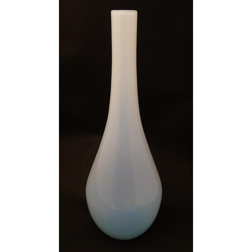 209 - A large Art glass vase, the white glass with blue detail . Approx 20