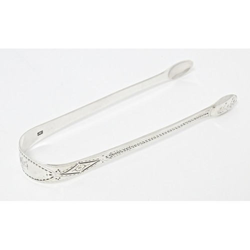 221 - Geo III silver sugar tongs with bright cut  decoration, hallmarked London 1799, maker Thomas Wallis.... 