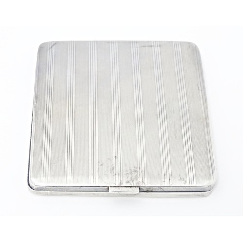 233 - An Art Deco silver cigarette case with engine turned decoration, hallmarked Birmingham 1928 maker Ma... 