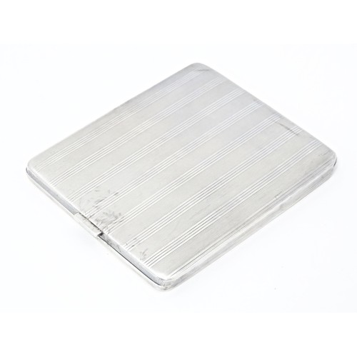 233 - An Art Deco silver cigarette case with engine turned decoration, hallmarked Birmingham 1928 maker Ma... 