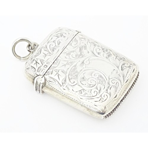 235 - A Victorian silver vesta case with engraved foliate decoration, hallmarked Chester 1897. Approx. 1 3... 