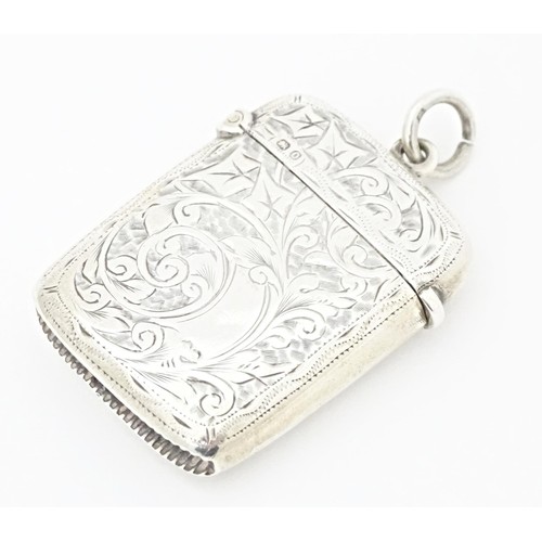 235 - A Victorian silver vesta case with engraved foliate decoration, hallmarked Chester 1897. Approx. 1 3... 