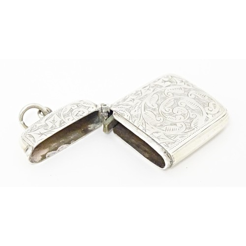 235 - A Victorian silver vesta case with engraved foliate decoration, hallmarked Chester 1897. Approx. 1 3... 