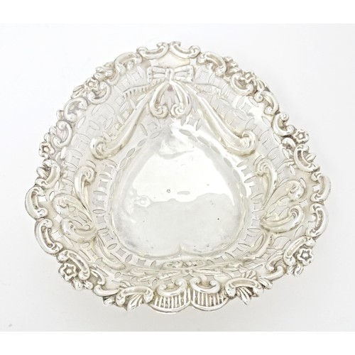 236 - A Victorian silver bonbon dish of heart form with embossed and pierced decoration, hallmarked Cheste... 