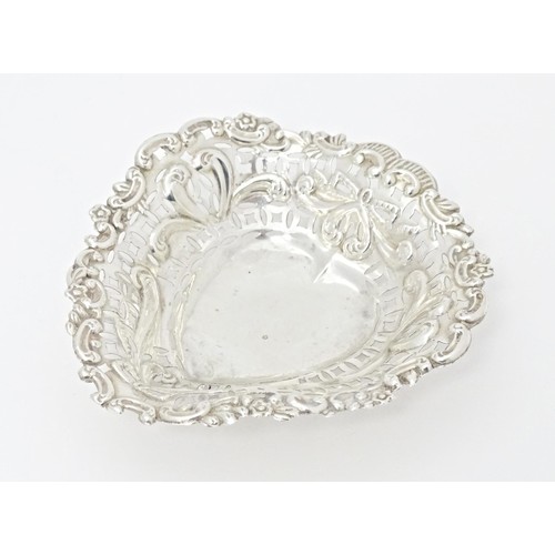 236 - A Victorian silver bonbon dish of heart form with embossed and pierced decoration, hallmarked Cheste... 