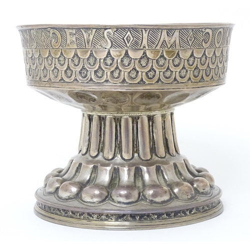 449 - A silver replica of the Tudor cup (Holms cup) of font shape with raised and chased repousse circular... 