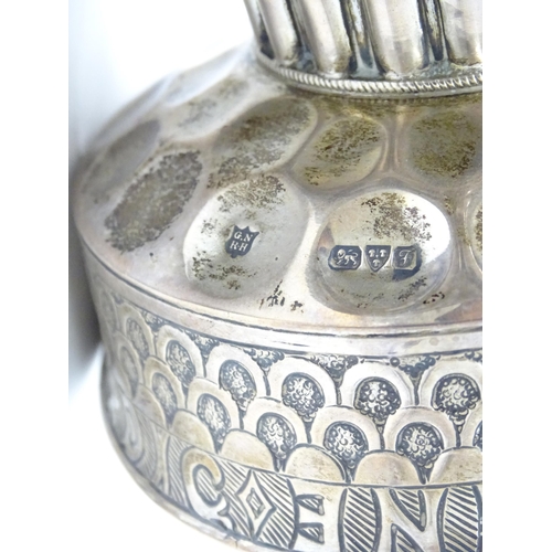 449 - A silver replica of the Tudor cup (Holms cup) of font shape with raised and chased repousse circular... 