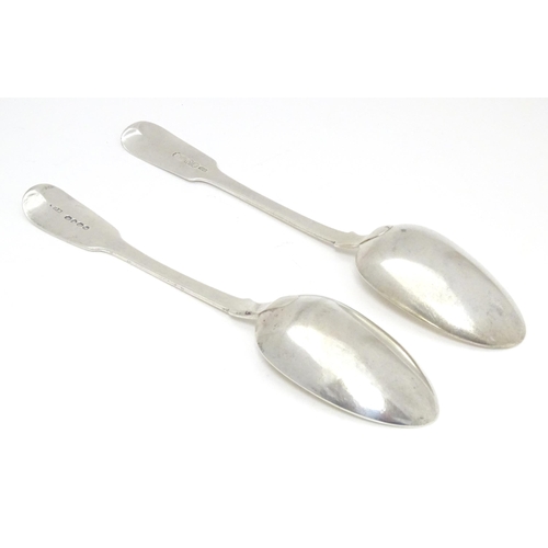 450 - Two silver Fiddle pattern table spoons, on Scottish hallmarked Edinburgh 1838, maker David Hodges, t... 