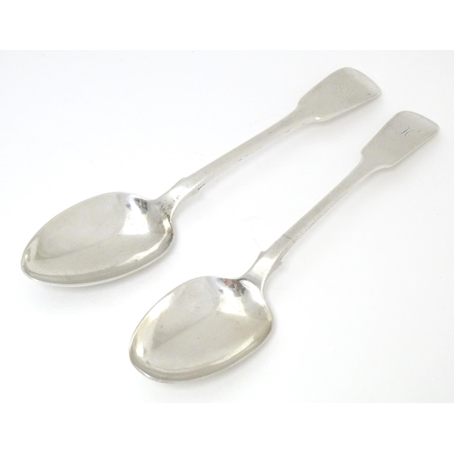 450 - Two silver Fiddle pattern table spoons, on Scottish hallmarked Edinburgh 1838, maker David Hodges, t... 