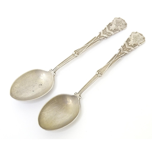 451 - A pair of silver spoons decorated with golf clubs, golf balls, etc. hallmarked Sheffield 1931,
maker... 