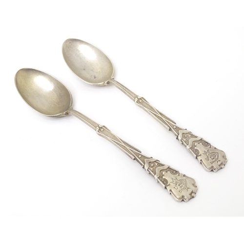 451 - A pair of silver spoons decorated with golf clubs, golf balls, etc. hallmarked Sheffield 1931,
maker... 