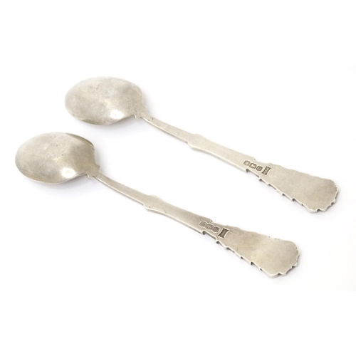 451 - A pair of silver spoons decorated with golf clubs, golf balls, etc. hallmarked Sheffield 1931,
maker... 