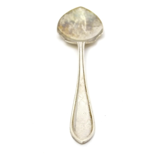 452 - A silver preserve spoon hallmarked Sheffield 1959, maker Viner' Ltd. Together with silver sugar tong... 