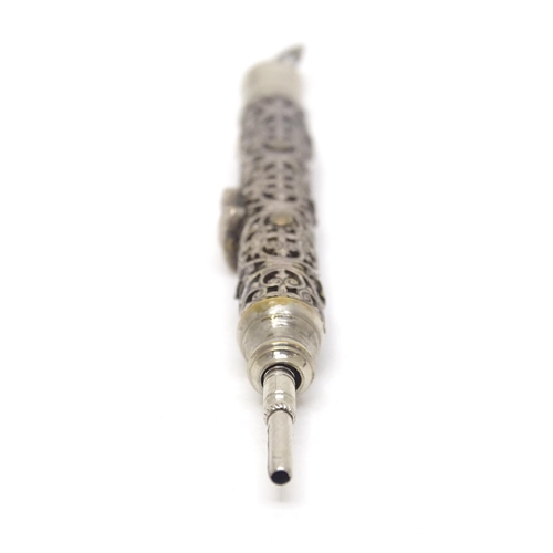 457 - A silver plate propelling pencil with filigree style decoration and applied Napoleon bust. Approx. 3... 