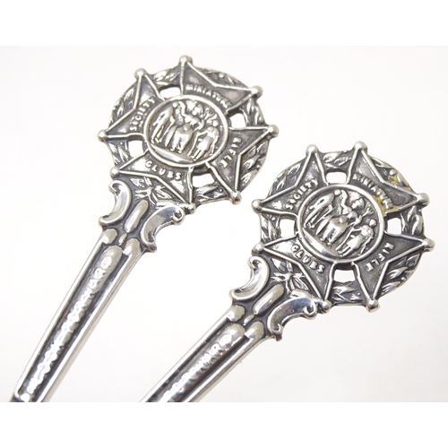 461 - A pair of silver teaspoons the handles surmounted by crest for Miniature Rifle Clubs Society, titled... 