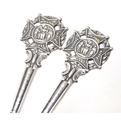 461 - A pair of silver teaspoons the handles surmounted by crest for Miniature Rifle Clubs Society, titled... 