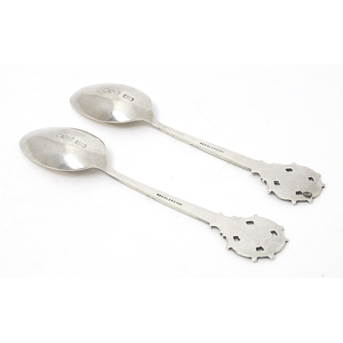 461 - A pair of silver teaspoons the handles surmounted by crest for Miniature Rifle Clubs Society, titled... 