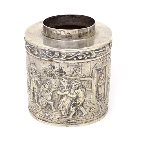 470 - A Continental silver caddy with embossed decoration depicting musicians, figures imbibing, dancing, ... 